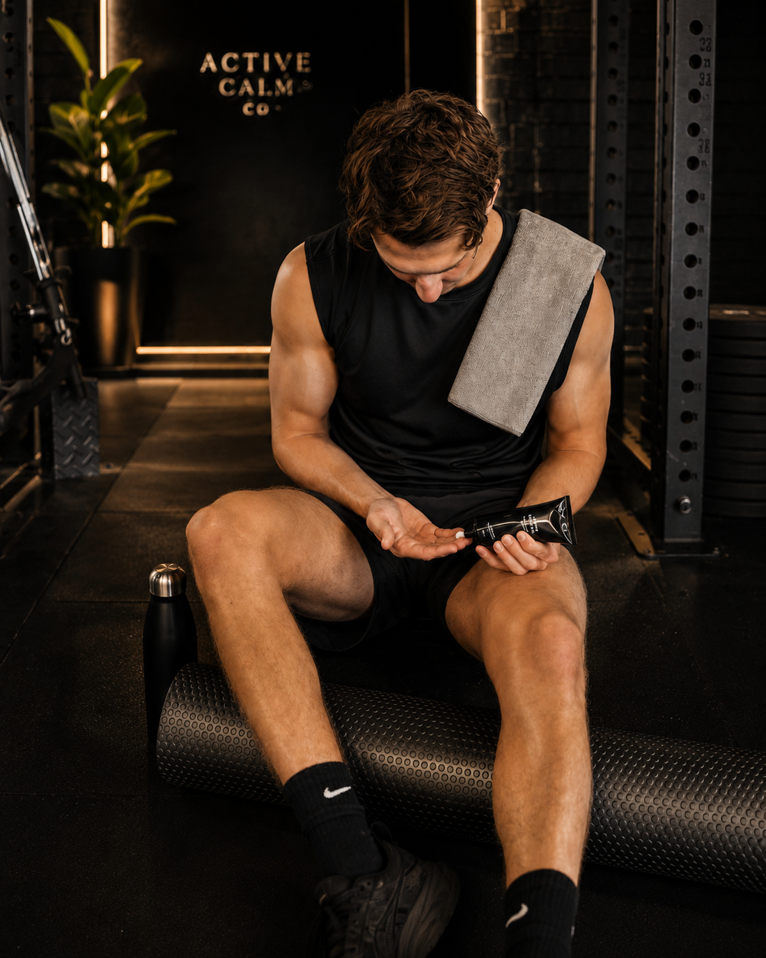 Wide gym scene — active people who benefit from topical magnesium for muscle recovery